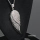 Load and play video in Gallery viewer, Jewelili Sterling Silver With 1/10 CTTW Diamonds Angel Wing Pendant Necklace
