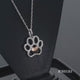 Load and play video in Gallery viewer, Jewelili Sterling Silver and 10K Rose Gold Natural White Round Diamonds Paw Heart Pendant Necklace
