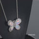 Load and play video in Gallery viewer, Jewelili Sterling Silver With Created Opal and Created White Sapphire Butterfly Pendant Necklace
