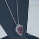 Load and play video in Gallery viewer, Jewelili Sterling Silver with Heart Shape Created Ruby and Round Created White Sapphire with Diamonds Heart Pendant Necklace
